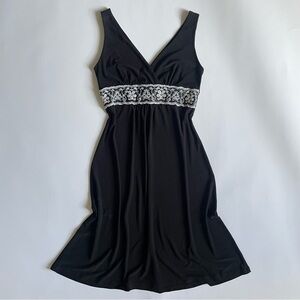 B. Moss Elegant Black Midi Dress with White Accents